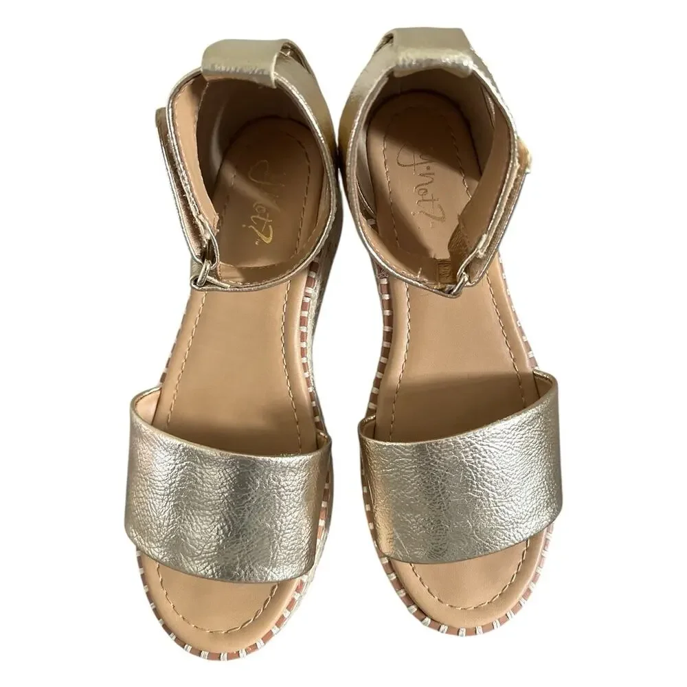 Y-Not Tuckin Platform Wedges in a metallic light gold finish.Size 6.5